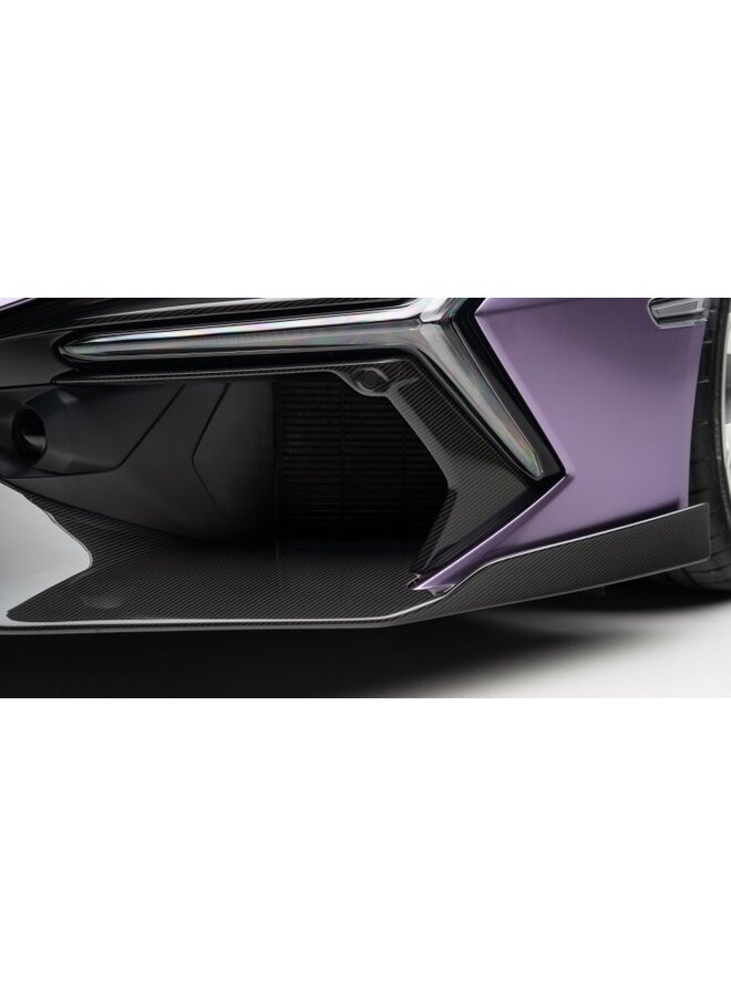 Cela concerne un ensemble de caches canards de pare-chocs avant en carbone Lamborghini Revuelto Novitec.