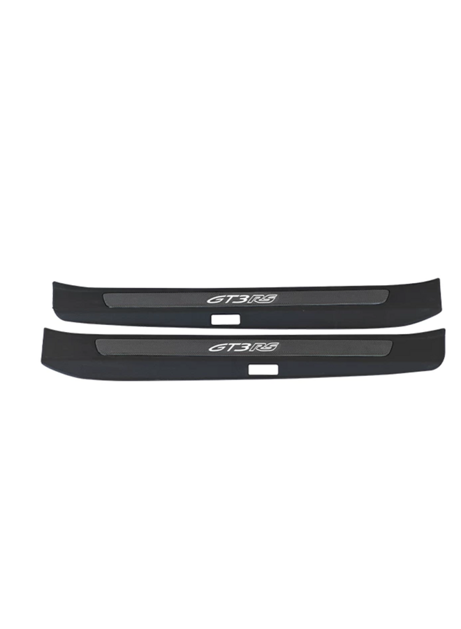 This concerns a set of Porsche 911 992 carbon trim sill plates.