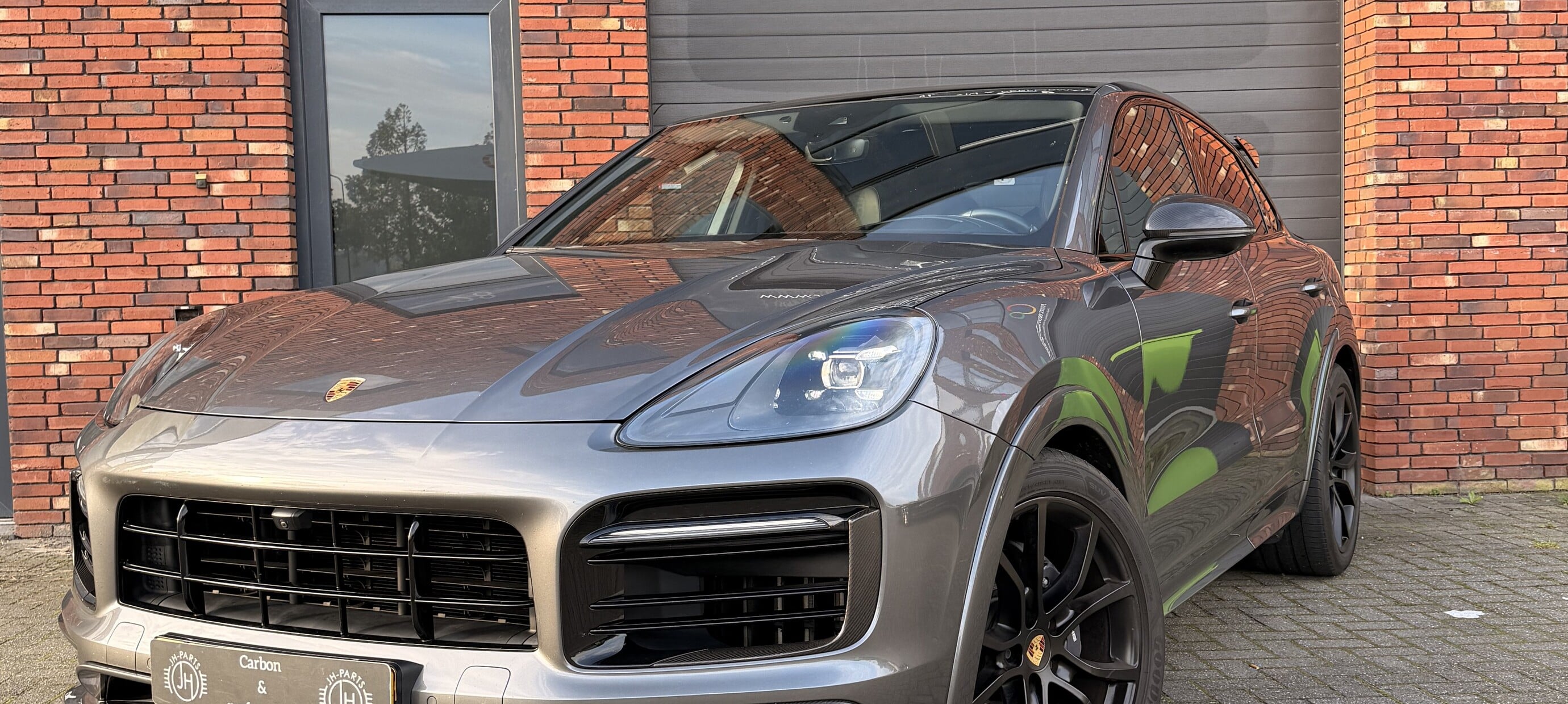 Porsche Cayenne Coupé en JHParts con splitter TK y detalles de carbono