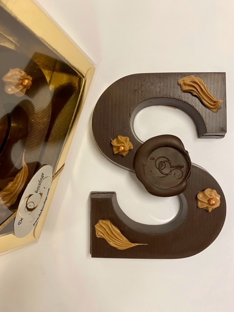 Dark chocolate letter with sea salt caramel filling