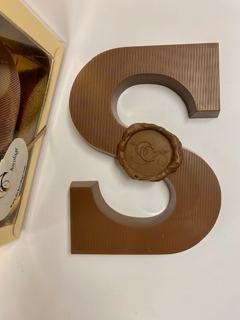 Milk chocolate letter with aniseed
