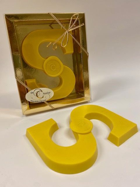 White chocolate letter with kurkuma