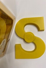 White chocolate letter with kurkuma