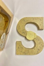 Chocolate letter with cloves and cacao nibs