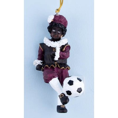 Typisch Hollands Schwarzer Piet mit einem Fußball