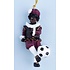 Typisch Hollands Schwarzer Piet mit einem Fußball