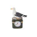 Typisch Hollands Gull on beach pole with clock