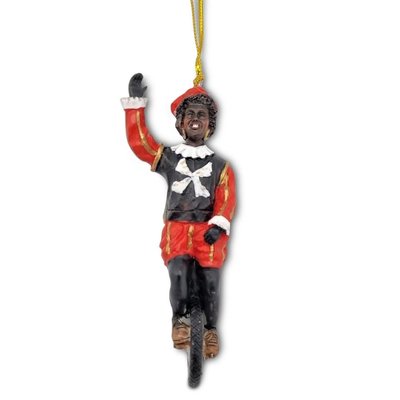 Typisch Hollands Black Pete auf einem Einrad