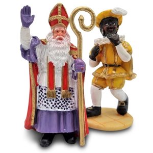 Typisch Hollands Sinterklaas und Piet mit gelbem Kostüm.