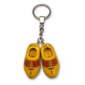 Typisch Hollands Schlüsselanhänger 2 Clogs - Gelbe Bauernhausverkleidung