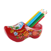 Matix Clog with pencil sharpener and red colored pencils