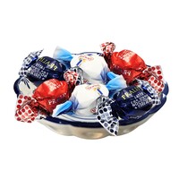 Typisch Hollands Delft blue bowl with chocolate balls in red-white-blue