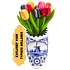 Nijhuis  Delfts blauwe klomp met houten tulpen.