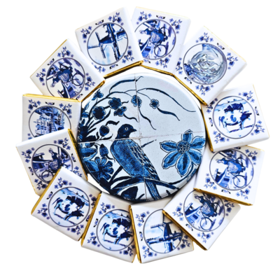 Typisch Hollands Delft blue tile tableau tin with chocolate tiles.