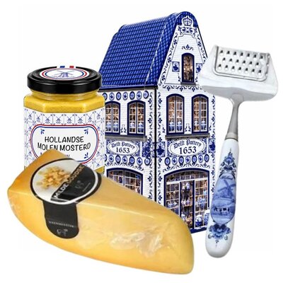 Typisch Hollands Käse in einer Geschenkdose mit Käsereibe und Senf.