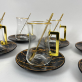 18 - delige thee set - zwart marmer / goud
