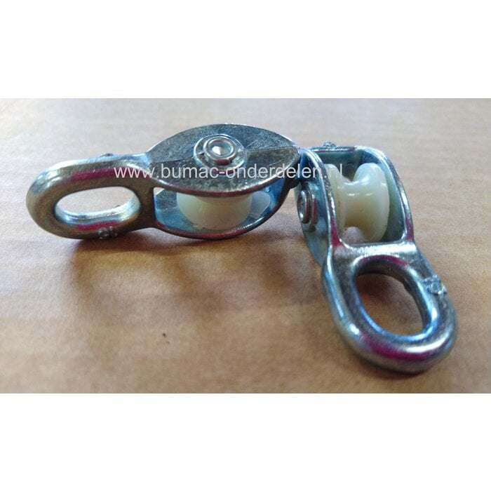 Katrol 12mm, Vast Oog, Verzinkt, Nylon Wiel Max belasting 390Kg Met een katrol is het onder meer mogelijk om zwaardere voorwerpen eenvoudig op te takelen. Maar ook om een kabel een hoek om te laten geleiden Katrollen worden voor verschillende klussen in e