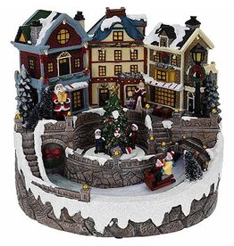 Kerstdorp met verlichting en beweging