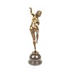 Bronze sculpture of a nude female juggler with magic rings