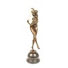 Bronze sculpture of a nude female juggler with magic rings