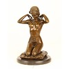 Bronze sculpture of a naked woman putting on her necklace