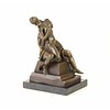 Bronze sculpture of a couple making love