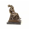 Bronze sculpture of a couple making love