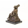 Bronze sculpture of a couple making love