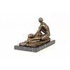 Bronze sculpture of a fellatio scene