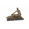 Bronze sculpture of a fellatio scene