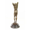 Bronze sculpture of a nude male posing