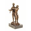 Bronze sculpture of a gay couple standing back to back