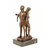 Bronze sculpture of a gay couple standing back to back