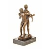 Bronze sculpture of a gay couple standing back to back