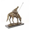 Bronze sculpture of a soldier on horseback