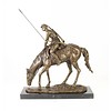 Bronze sculpture of a soldier on horseback