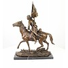 Bronze sculpture of an armed Cossack on horseback