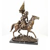 Bronze sculpture of an armed Cossack on horseback