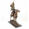 Bronze sculpture of an armed Cossack on horseback