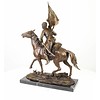 Bronze sculpture of an armed Cossack on horseback