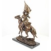 Bronze sculpture of an armed Cossack on horseback