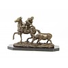 Bronze sculpture of a hunter on a horseback