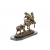 Bronze sculpture of a hunter on a horseback