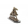Bronze sculpture of a hunter on a horseback