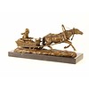 Bronze sculpture of a horse drawn sleigh