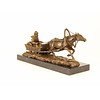 Bronze sculpture of a horse drawn sleigh