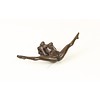 Bronze sculpture of a nude female with legs spread