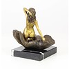 Bronze sculpture of a nude female in a palm of a hand