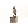 Bronze sculpture of a camel with it's rider