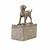 Bronze sculpture of a standing dog